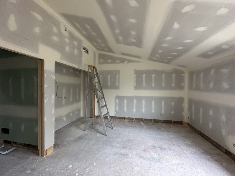 Expert complete drywall services showcasing a seamless drywall installation process in a residential home.