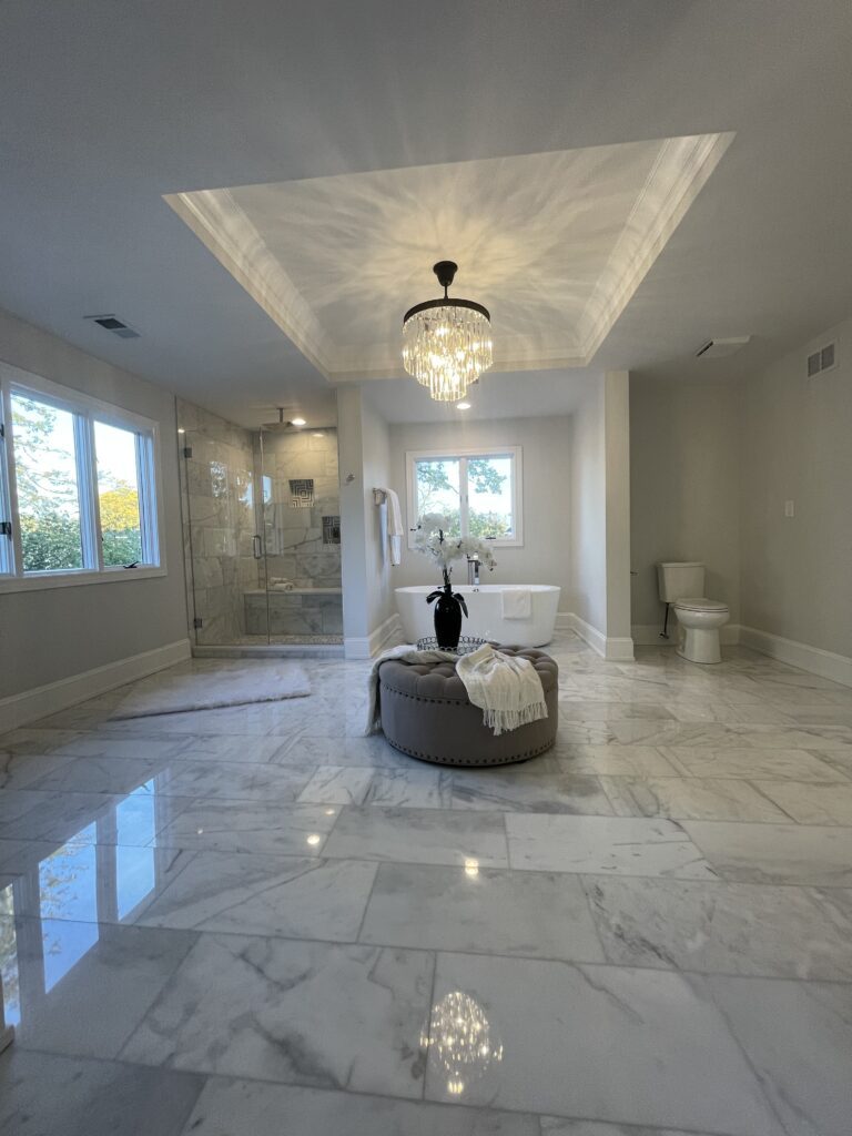 An elegant bathroom with a double vanity and stylish lighting fixtures