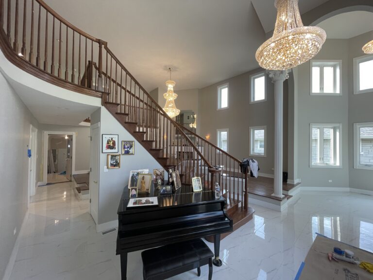 Stunning transformation of the living room, featuring contemporary furnishings, vibrant decor, and ample natural light.