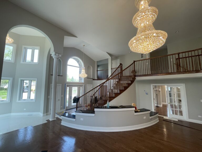 Bright and airy open living area with hardwood floors